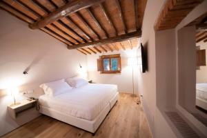 Postel nebo postele na pokoji v ubytování Villa Barberino