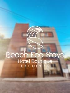 a hotel logo with a hotel boutique lacomaru at Beach Eco Stays Hotel Boutique Lagoinha in Tigre