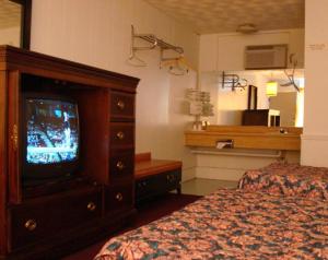 Postel nebo postele na pokoji v ubytování Gray Plaza Motel