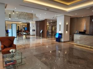 A área de receção ou átrio de Gloria Hotel & Suites Doha