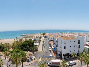 an aerial view of a city with the beach at VACATION MARBELLA I Puerto Banus Sea Front, Terrace, Puerto Banus Marina, Pool in Marbella