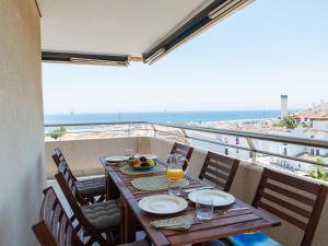 a table with food and a view of the ocean at VACATION MARBELLA I Puerto Banus Sea Front, Terrace, Puerto Banus Marina, Pool in Marbella
