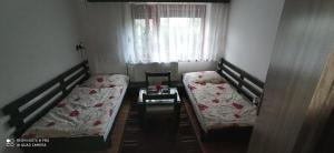 Posteľ alebo postele v izbe v ubytovaní Privat L&L