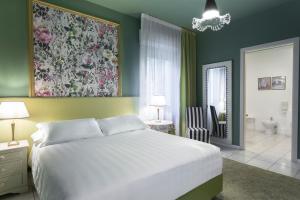 Postel nebo postele na pokoji v ubytování B&B Maison Biagetti