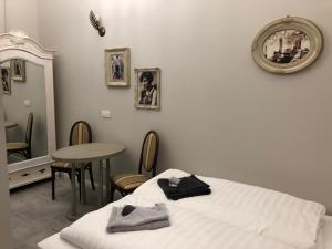Posteľ alebo postele v izbe v ubytovaní All In Apartman IV.