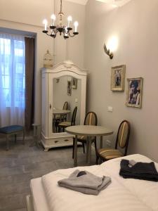 Posteľ alebo postele v izbe v ubytovaní All In Apartman IV.