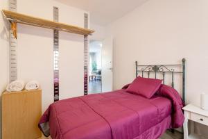 Säng eller sängar i ett rum på Apartamento Salamanca 10