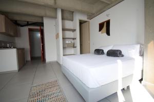 Postel nebo postele na pokoji v ubytování Mangata Living by Bernalo Hotels