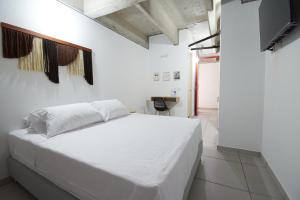 Postel nebo postele na pokoji v ubytování Mangata Living by Bernalo Hotels