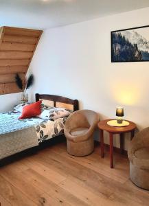 Posteľ alebo postele v izbe v ubytovaní Apartament dwupoziomowy u Samków