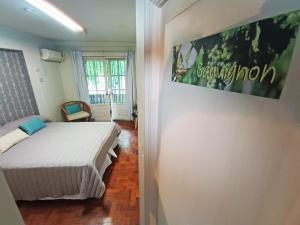 a bedroom with a bed in a room at HOSTEL KUYUK in Mendoza