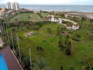 an aerial view of a park next to the ocean at OceanView Apartment in La Manga del Mar Menor