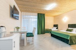 Postel nebo postele na pokoji v ubytování Milana SPA & Hotel - SPA included