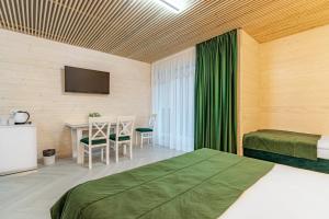Postel nebo postele na pokoji v ubytování Milana SPA & Hotel - SPA included