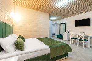 Postel nebo postele na pokoji v ubytování Milana SPA & Hotel - SPA included