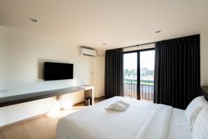 Postel nebo postele na pokoji v ubytování JS HOTEL
