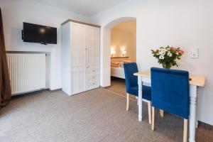 Μια τηλεόραση ή/και κέντρο ψυχαγωγίας στο Haus Dippel am Kurpark inklusive Chiemgaukarte