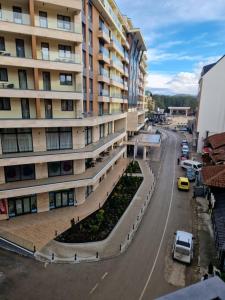 a street in front of a large building at Palace 15 in Zlatibor