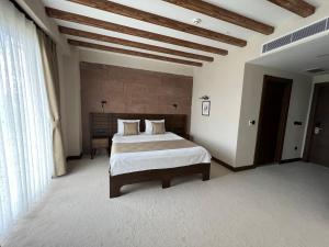 Postel nebo postele na pokoji v ubytování Pinhan Otel Kazdağıları