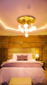 Letto o letti in una camera di TN MAX LUXURY HOME