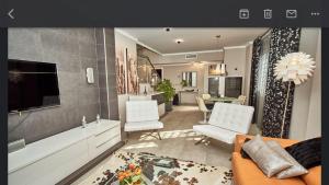 Posezení v ubytování Chalet de lujo