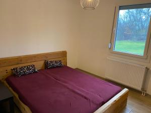 Postel nebo postele na pokoji v ubytování Kućica u šumici