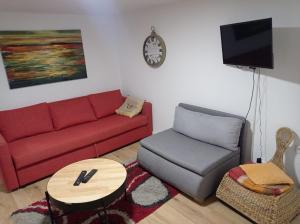 Khu vực ghế ngồi tại Apartmani Hanna
