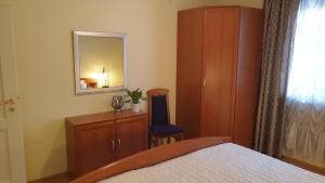Posteľ alebo postele v izbe v ubytovaní Apartments Aurora Borik