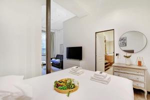 Televízia a/alebo spoločenská miestnosť v ubytovaní Chic apartment - 3BR-8P - Le Marais