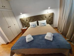 En eller flere senger på et rom på Apartamentos Navio Azul