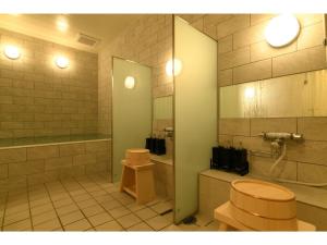 a bathroom with a toilet and a sink and a tub at Hotel Wisteria NARA - Vacation STAY 99258v in Nara