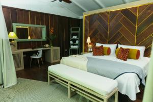 Ένα ή περισσότερα κρεβάτια σε δωμάτιο στο Mawamba Lodge