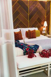 Ένα ή περισσότερα κρεβάτια σε δωμάτιο στο Mawamba Lodge