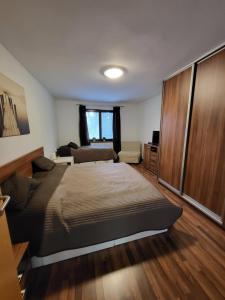 Posteľ alebo postele v izbe v ubytovaní Apartmán Lipno 50