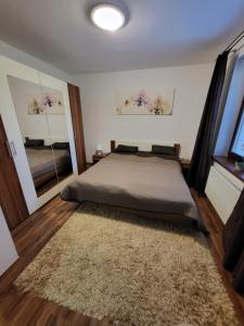 Posteľ alebo postele v izbe v ubytovaní Apartmán Lipno 50