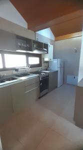 Una cocina o kitchenette en Edificio Calderon UF33