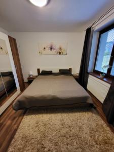 Posteľ alebo postele v izbe v ubytovaní Apartmán Lipno 50