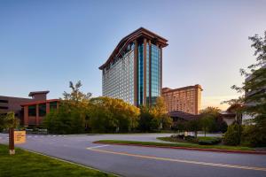 an empty street with a tall building in the background at Harrah's Cherokee, A Caesars Destination in Cherokee