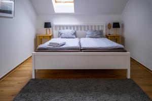 Postel nebo postele na pokoji v ubytování Duplex apartmán Pálava