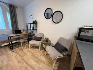 Posedenie v ubytovaní Studio cosy rez-de-chaussée