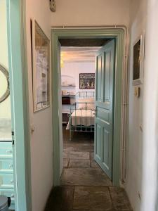 A bed or beds in a room at Galatea House Katoï with patio