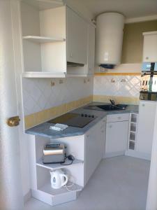 Η κουζίνα ή μικρή κουζίνα στο Appartement lumineux et spacieux en centre ville +4 φωτογραφίες