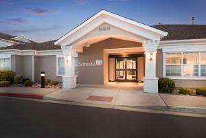 a large house with a driveway at Sonesta ES Suites Reno in Reno