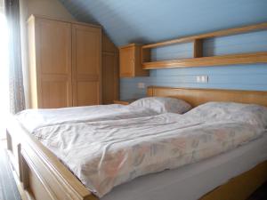 Postel nebo postele na pokoji v ubytování Ferienwohnungen/Holiday Apartments Lederer