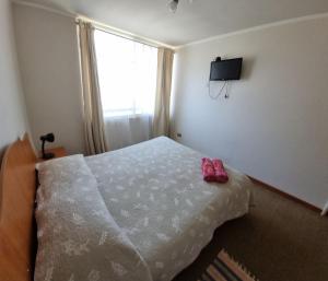 Ένα ή περισσότερα κρεβάτια σε δωμάτιο στο Apartamento V Region +23 φωτογραφίες