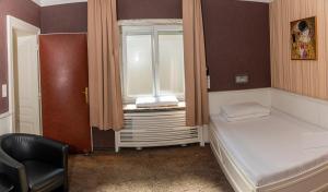 Postel nebo postele na pokoji v ubytování Hotel Goldene Spinne