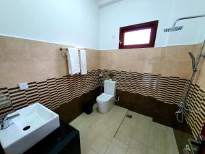 Koupelna v ubytování Relax Inn
