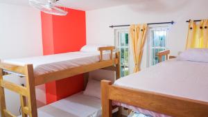 Katil atau katil-katil dalam bilik di Cabana Isla Mar