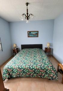 Postel nebo postele na pokoji v ubytování Maison Le Pin