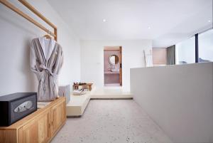 Postel nebo postele na pokoji v ubytování Sky Garden Inn